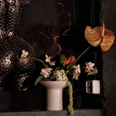 ikebana arrangement anthurium orchid amaranth